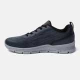 Blue comfort sneaker by Bugatti, shown in a side view with dark laces and a contrasting gray sole.