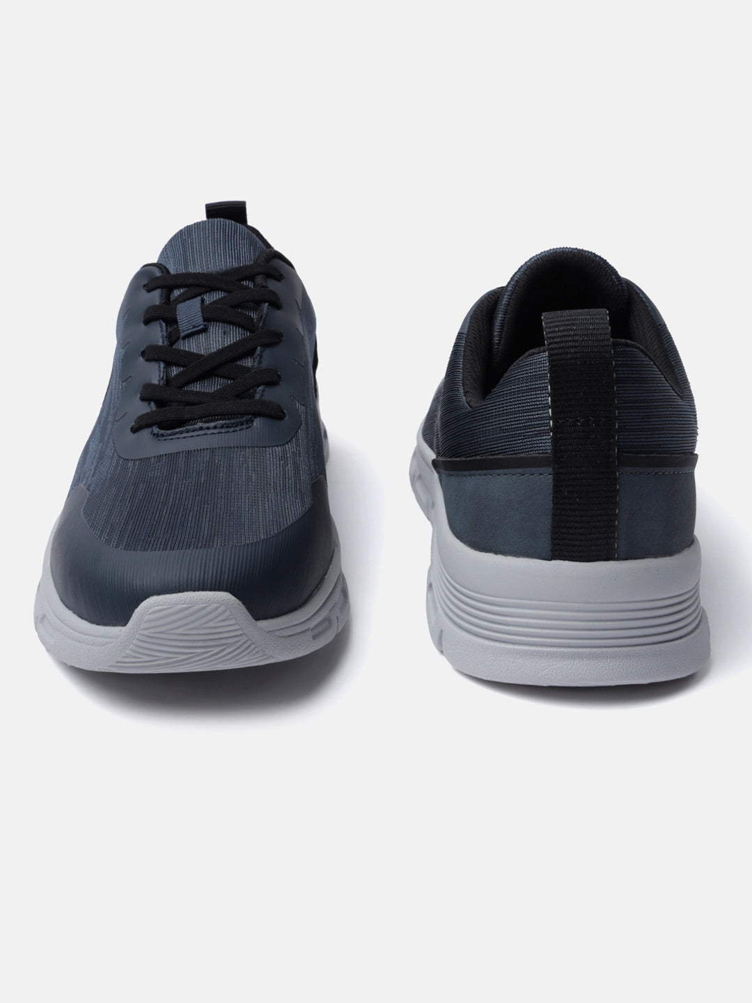 Blue comfort sneakers by bugatti, with black laces and a grey, ridged sole.