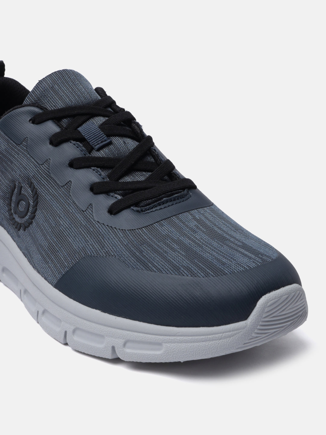 Blue and gray sneakers by bugatti with black laces and a textured upper.