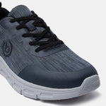 Blue and gray sneakers by bugatti with black laces and a textured upper.