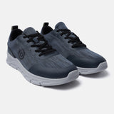 Blue comfort sneakers by bugatti, featuring a subtle striped pattern and black laces.