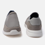 A grey Men's bugatti Slip-On Sneakers featuring a round plain toe, zero heels heel. Made from textile with a durable eva outsole, this slip-on design offers both style and comfort.