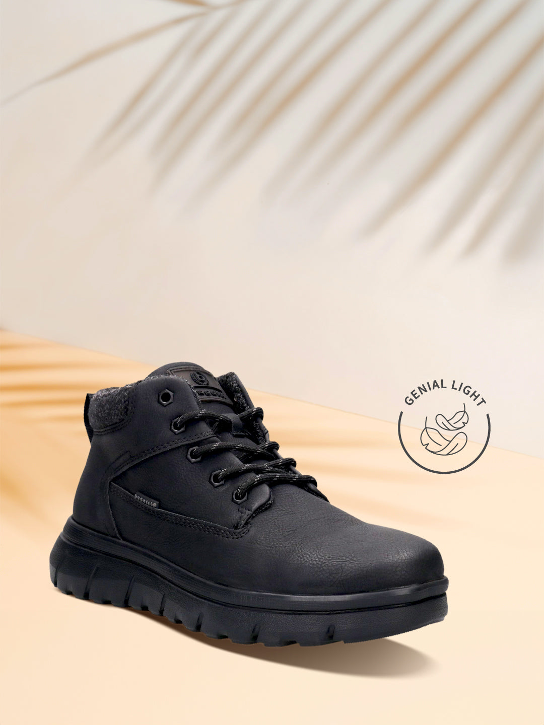 Black casual boot by Bugatti with textile collar, and a rugged lug sole.