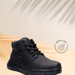Black casual boot by Bugatti with textile collar, and a rugged lug sole.