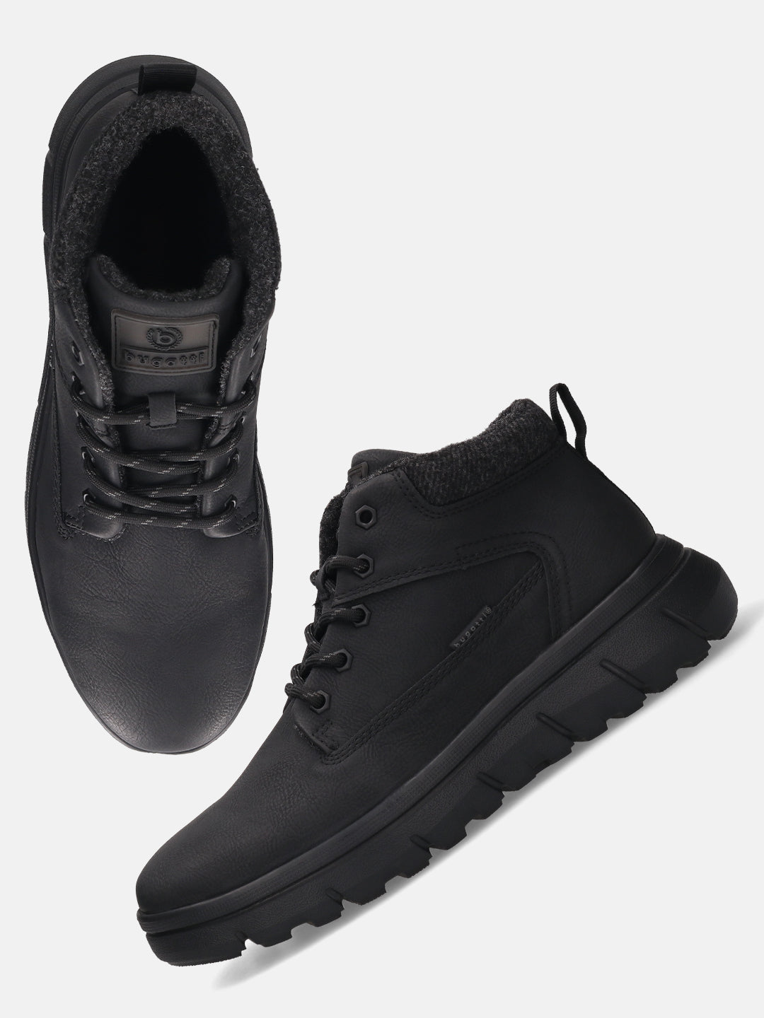 Black casual boots by bugatti with lace-up closure and textured trim.
