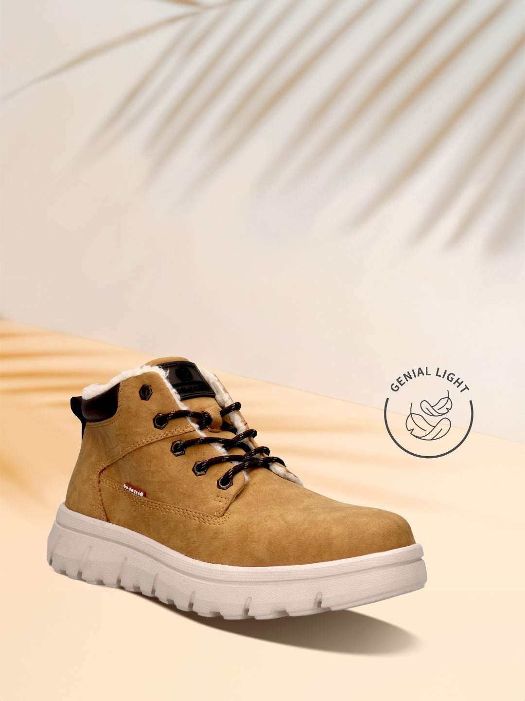 Yellow casual boot by Bugatti, with black laces and a white treaded sole.