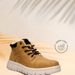 Yellow casual boot by Bugatti, with black laces and a white treaded sole.