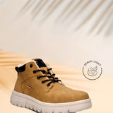 Yellow casual boot by Bugatti, with black laces and a white treaded sole.