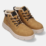 Tan comfort casual boots by Bugatti with brown laces, visible white faux fur lining and off-white soles.
