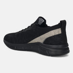 Black knit sneaker by Bugatti, with a light grey accent stripe along the side, in a side view.