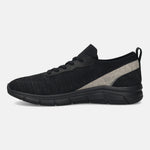 Black comfort sneaker by bugatti featuring a knit upper and silver accents at the heel.
