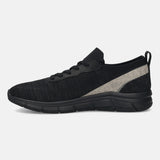Black comfort sneaker by bugatti featuring a knit upper and silver accents at the heel.
