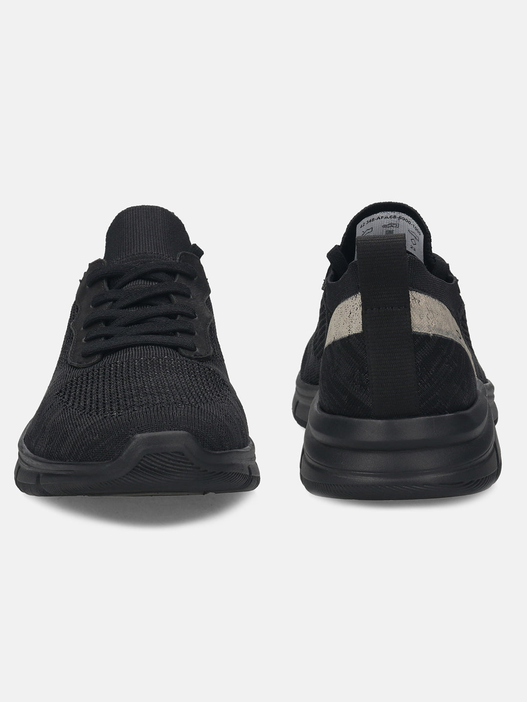 Black comfort mid-top sneakers by bugatti, with textured knit uppers and tonal soles.