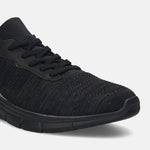 Black comfort sneakers by bugatti with knit textile and lace-up closure.