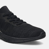 Black comfort sneakers by bugatti with knit textile and lace-up closure.