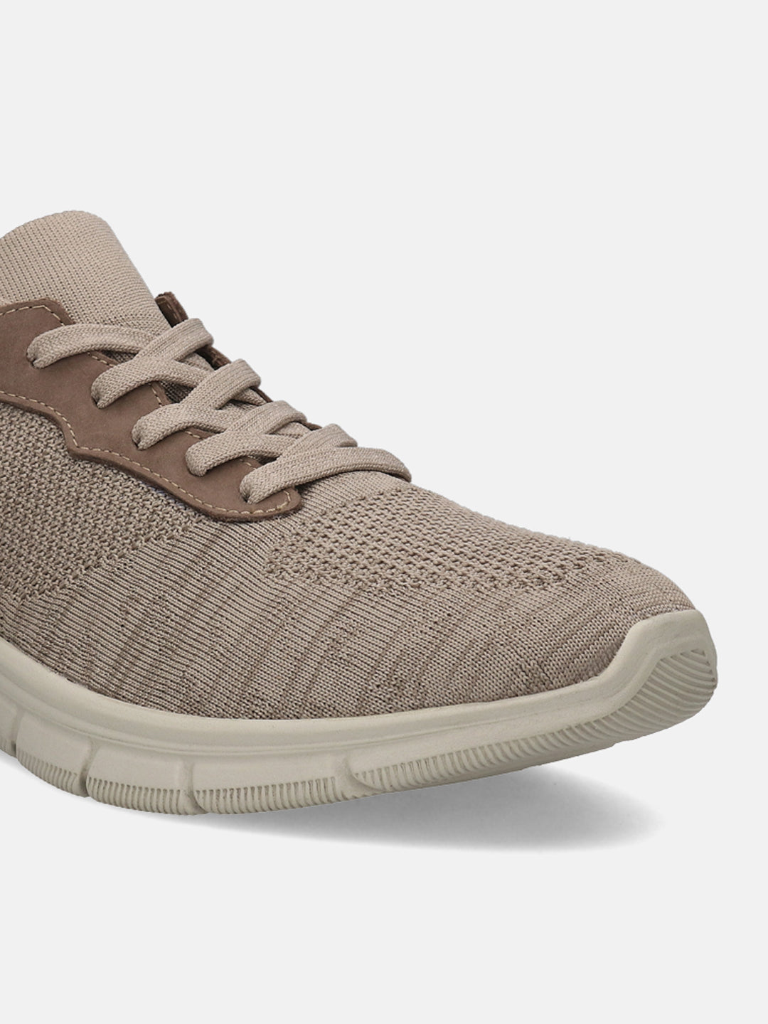 A beige Men's bugatti Sneakers featuring a round plain toe, zero heels heel. Made from textile with a durable eva outsole, this laces design offers both style and comfort.