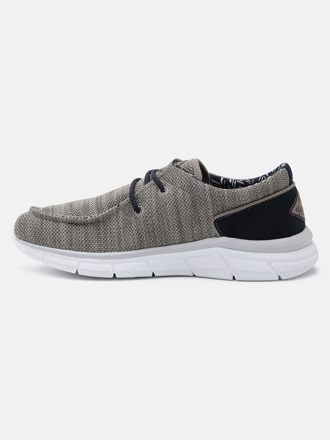 A beige Men's bugatti Sneakers featuring a round plain toe, zero heels heel. Made from textile with a durable eva outsole, this laces design offers both style and comfort.