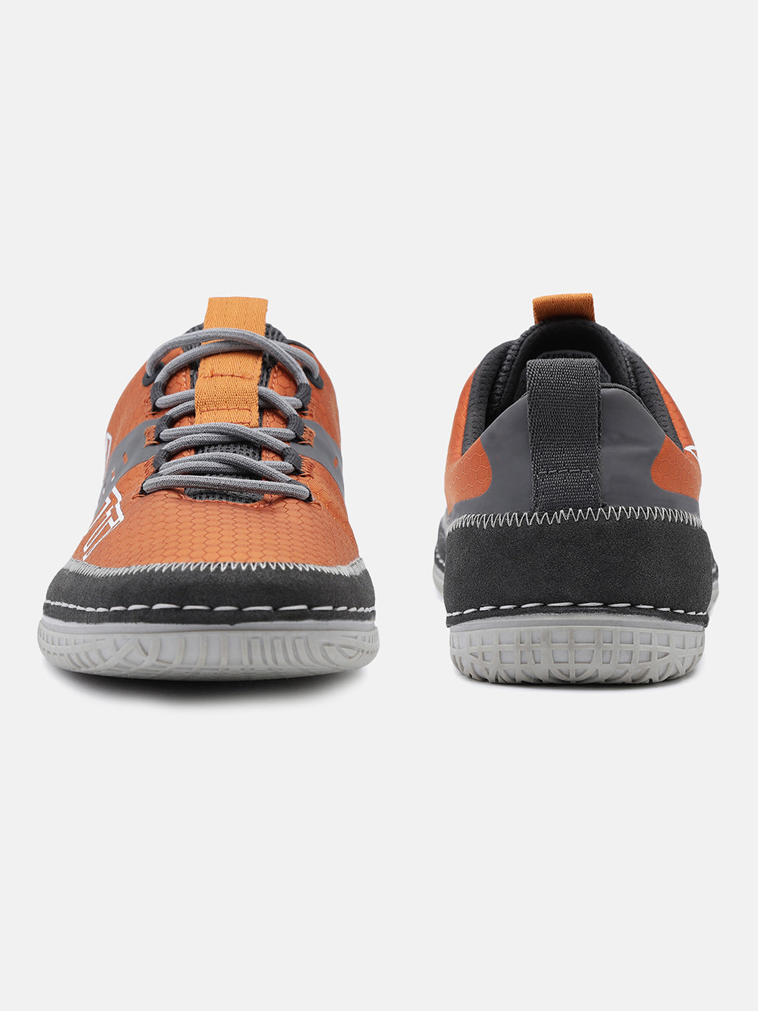 Orange comfort low-top sneakers by bugatti, featuring gray laces and a dark gray trim with white stitching.