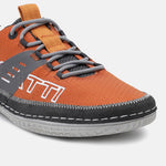 Orange low-top sneaker by bugatti with gray laces, a textured upper, and dark trim.