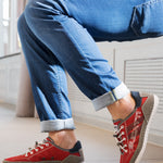 A grey Men's bugatti Sneakers featuring a round plain toe, zero heels heel. Made from synthetic with a durable tpr outsole, this laces design offers both style and comfort.