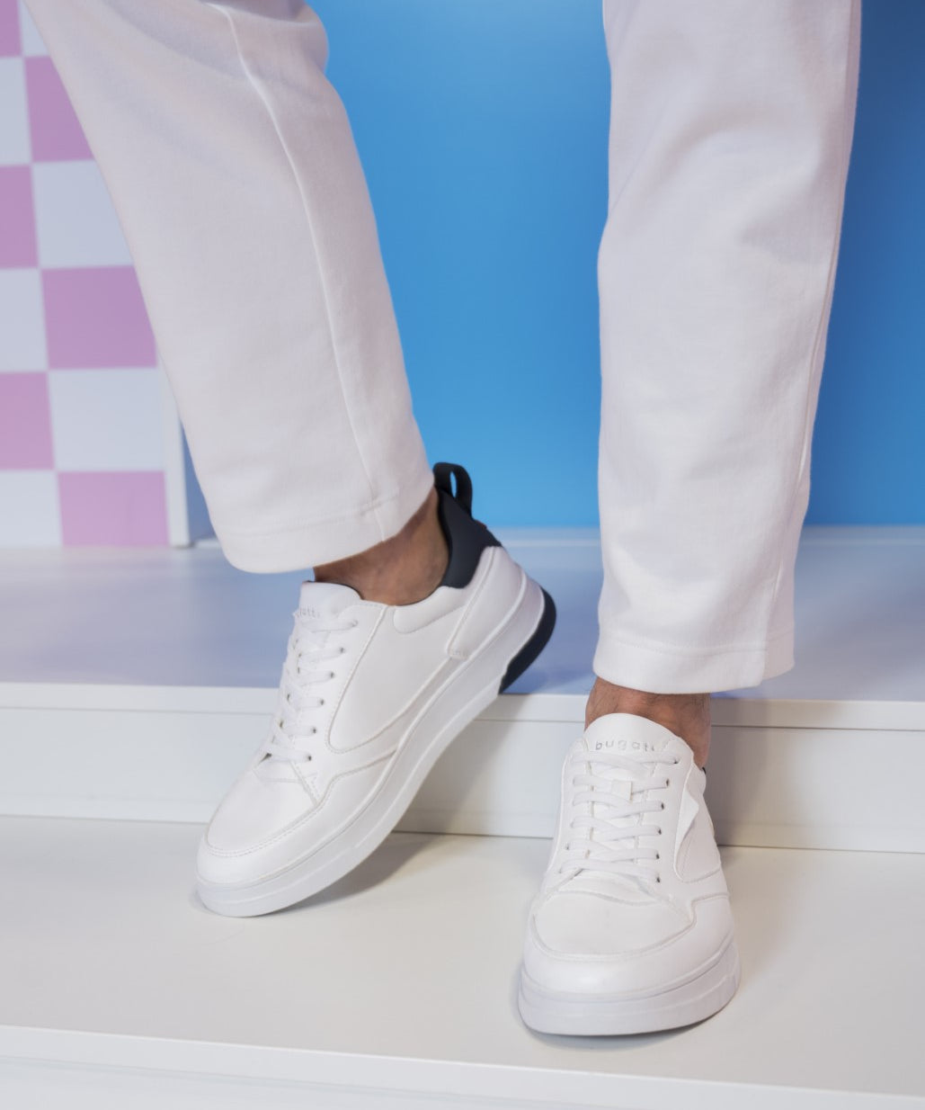 A white Men's bugatti Sneakers featuring a round plain toe, zero heels heel. Made from synthetic with a durable tpr outsole, this laces design offers both style and comfort.
