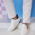 A white Men's bugatti Sneakers featuring a round plain toe, zero heels heel. Made from synthetic with a durable tpr outsole, this laces design offers both style and comfort.