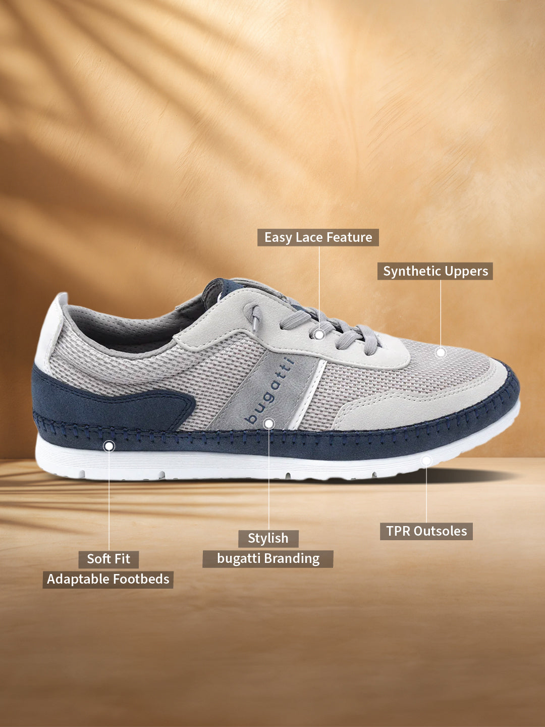 Grey low top sneaker by Bugatti, featuring synthetic uppers, an easy lace design, and navy blue detailing.