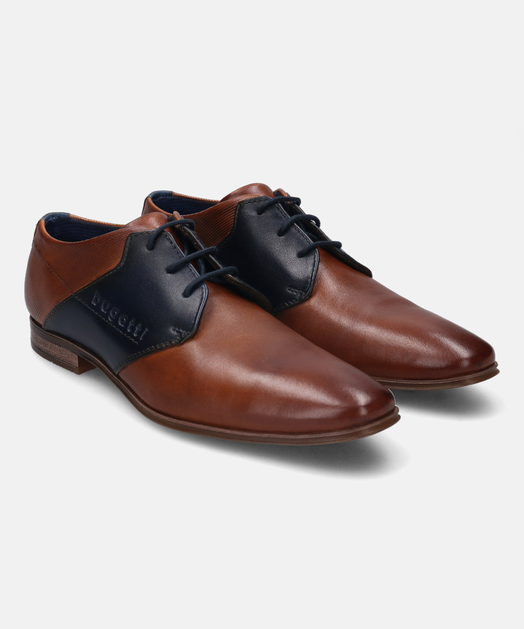 A cognac Men's bugatti Derby featuring a pointed plain toe, stacked heel. Made from premium genuine leather with a durable high quality synthetic outsole, this laces design offers both style and comfort.