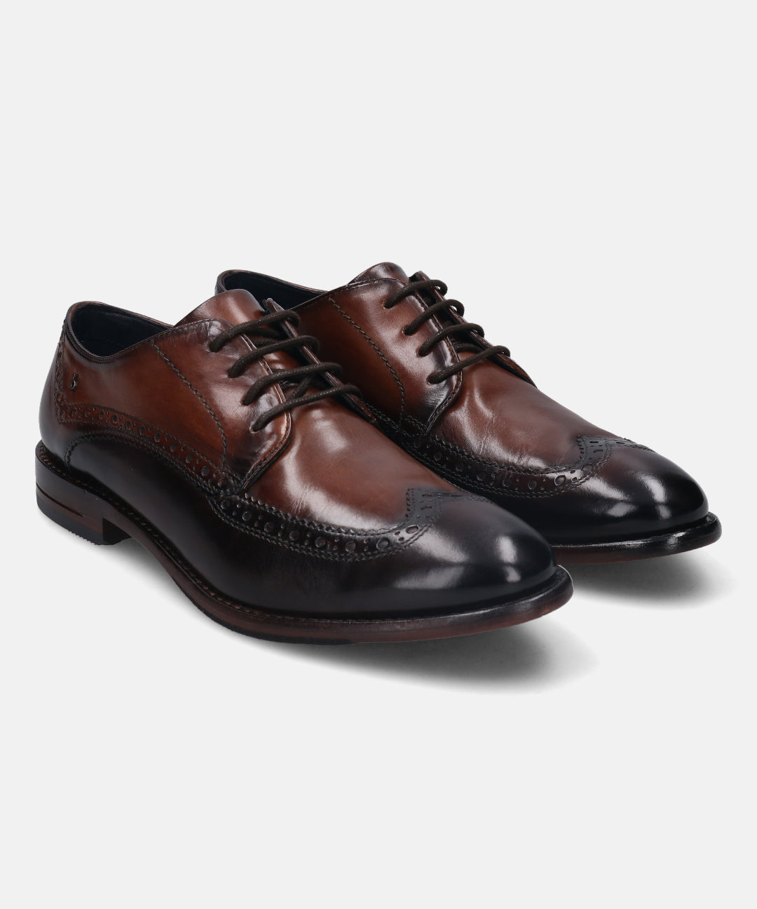 A brown Men's bugatti Brogue featuring a round wingcap, stacked heel. Made from premium genuine leather with a durable leather outsole, this laces design offers both style and comfort.