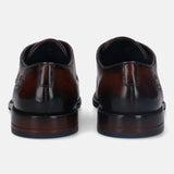 A brown Men's bugatti Brogue featuring a round wingcap, stacked heel. Made from premium genuine leather with a durable leather outsole, this laces design offers both style and comfort.
