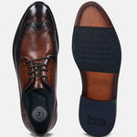 A brown Men's bugatti Brogue featuring a round wingcap, stacked heel. Made from premium genuine leather with a durable leather outsole, this laces design offers both style and comfort.
