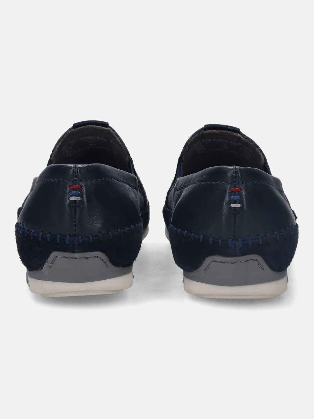 Dark blue leather casual slip-ons by bugatti, featuring decorative stitching and suede accents on the sides.