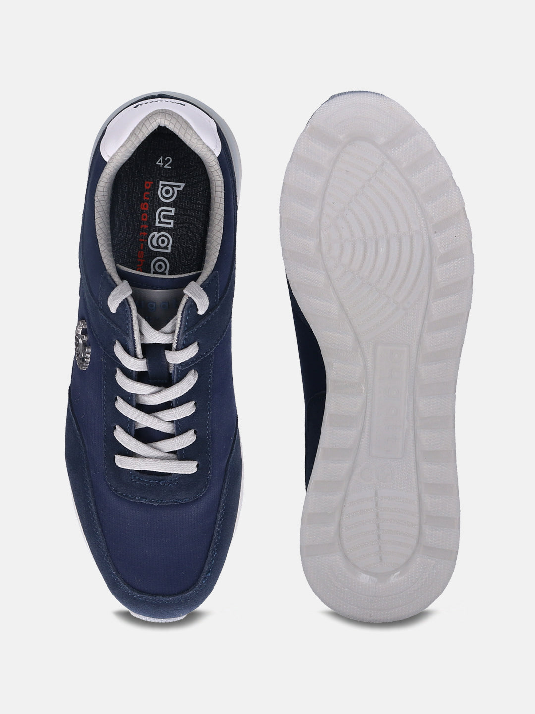Dark blue comfort sneakers by bugatti, showing the white laces and white ridged soles.