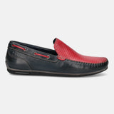 Dark blue leather loafer by bugatti, featuring a red perforated vamp, a dark sole, and red cord accents.
