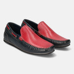 Dark blue and red leather slip-on shoes by Bugatti, with decorative perforations on the top.