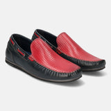 Dark blue and red leather slip-on shoes by Bugatti, with decorative perforations on the top.