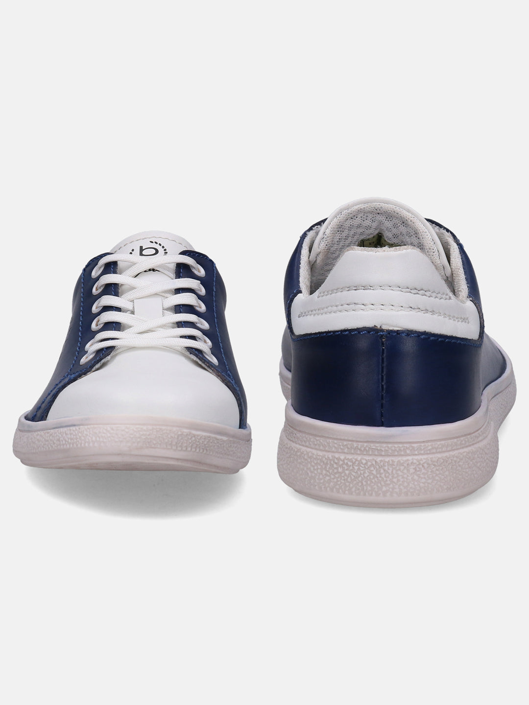 White and navy sneakers by bugatti with white laces and soles, viewed from the front and back.