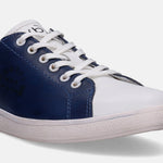 Two-tone sneakers by bugatti with navy and white panels, and white laces.