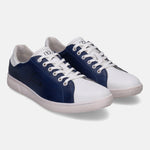 Leather sneakers by bugatti with white and blue color-blocking and white laces.