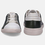 White and forest green sneakers by bugatti, with white laces and a matching sole.