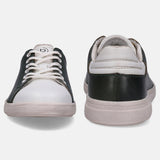 White and forest green sneakers by bugatti, with white laces and a matching sole.