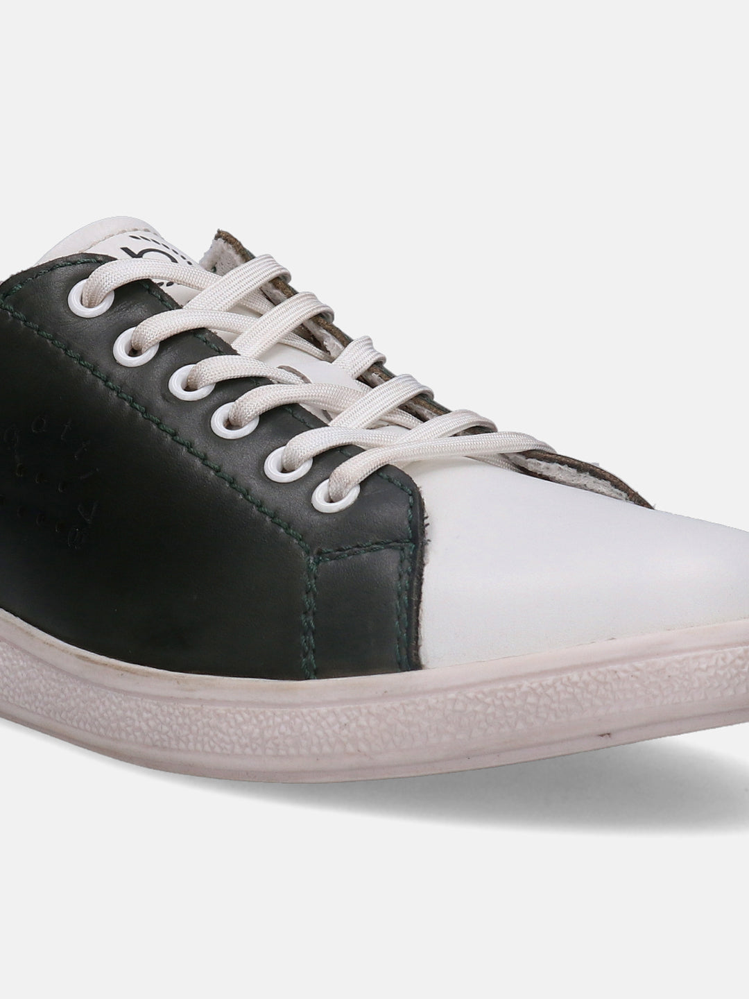 White and green leather sneaker by bugatti, with visible stitching and a textured sole.