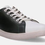 White and green leather sneaker by bugatti, with visible stitching and a textured sole.