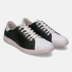 White and dark green leather sneakers by bugatti with white laces and textured sole.