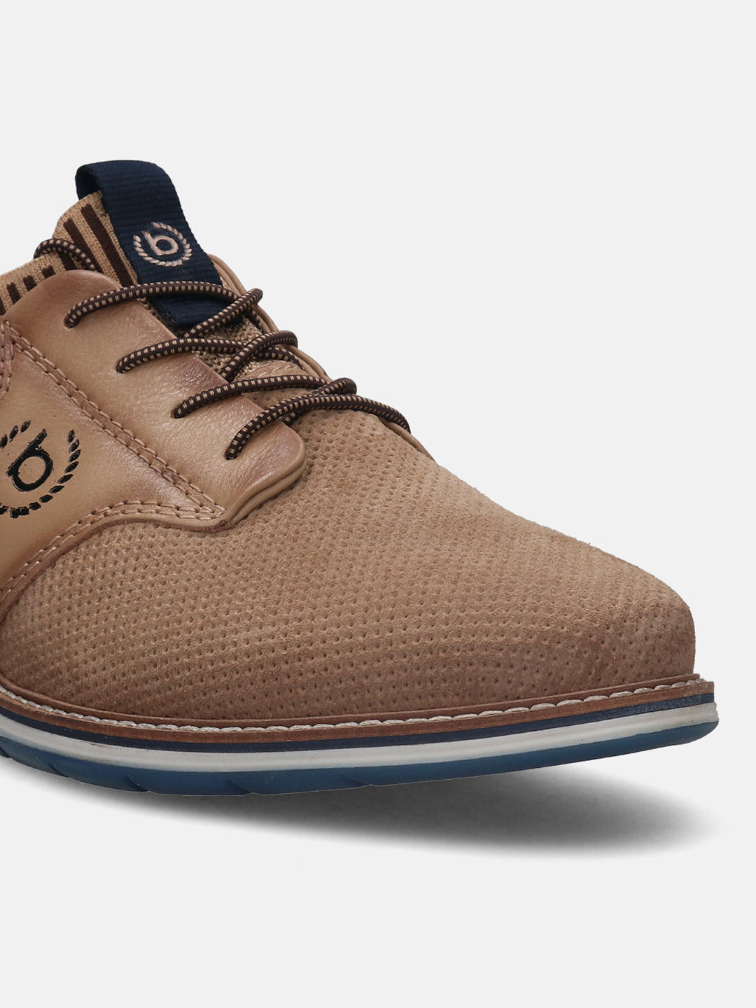 A beige Men's bugatti Oxford featuring a pointed plain toe, zero heels heel, and a wide fit. Made from premium genuine leather with a durable tpr outsole, this laces design offers both style and comfort.