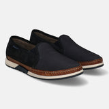A blue Men's bugatti  Slip-On Sneakers featuring a round toe plain toe, zero heels heel. Made from textile with a durable tpr outsole, this slip-on design offers both style and comfort.